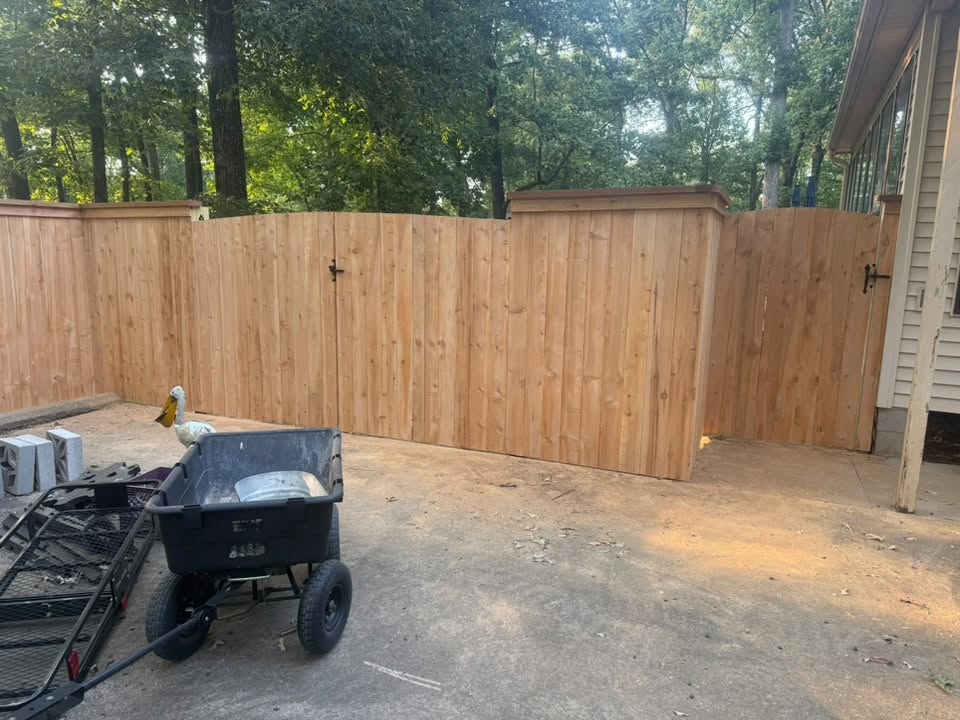 New wood privacy fence with gate built by Integrity Fence & Outdoor