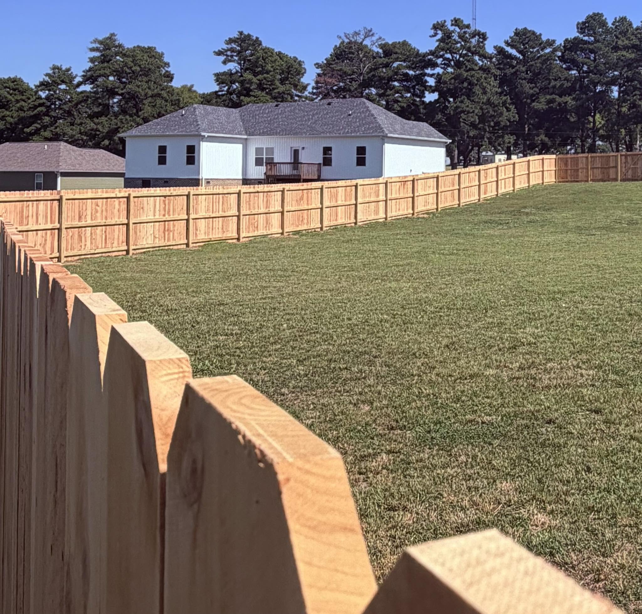 New wood privacy fence around a West Tennessee home, built by Integrity Fence & Outdoor